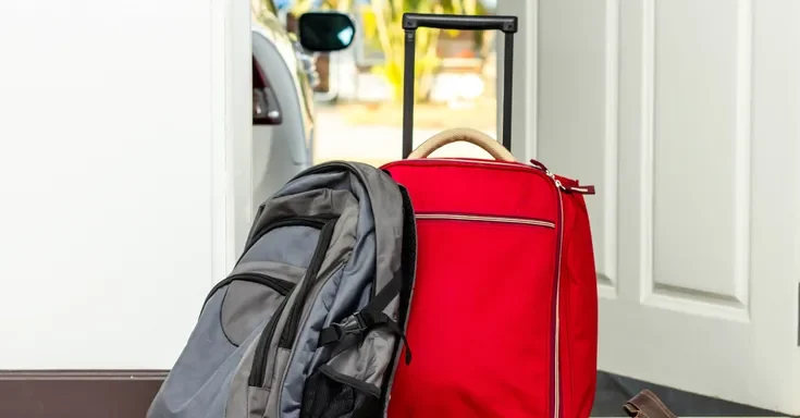 Bags by a door | Source: Shutterstock