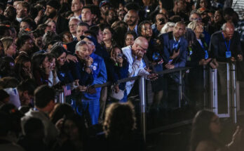 People watch election results come in at Vice President Kamala Harris’s election night event at Howard University in Washington, on Nov. 5, 2024. © Jamie Kelter Davis for POLITICO