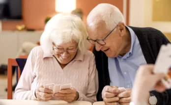 An elderly couple playing cards | Source: Getty Images