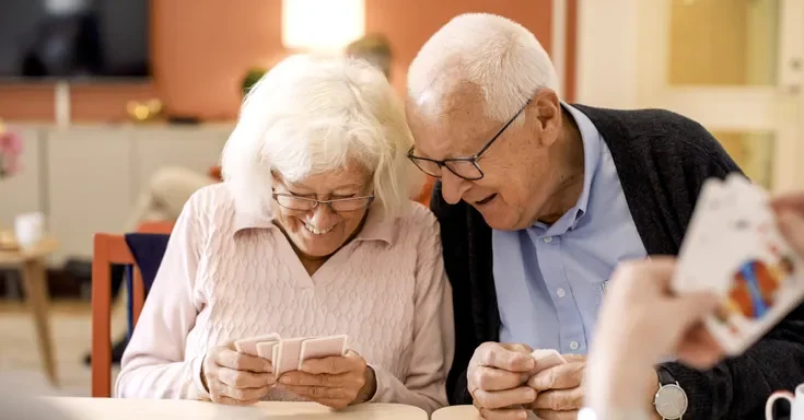 An elderly couple playing cards | Source: Getty Images