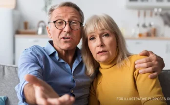 A man and woman looking on judgementally | Source: Shutterstock