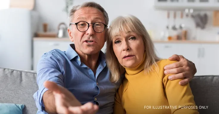 A man and woman looking on judgementally | Source: Shutterstock