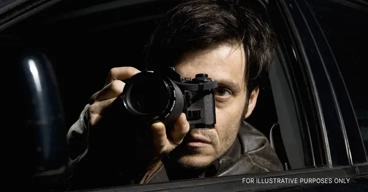 Man holding camera | Source: Getty Images