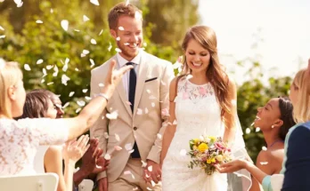 A smiling newlywed couple | Source: Shutterstock