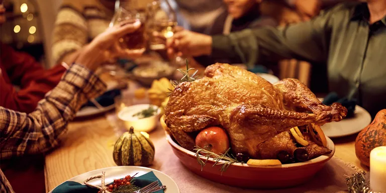 A family at a table | Source: Getty Images