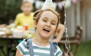 A happy child at her birthday party | Source: Shutterstock