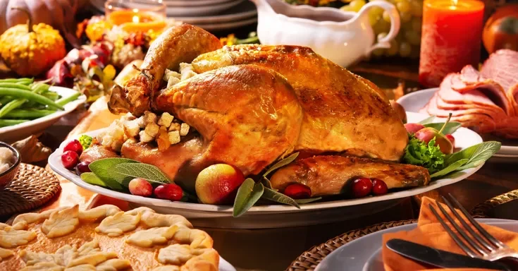 A Thanksgiving turkey on a dinner table | Source: Shutterstock