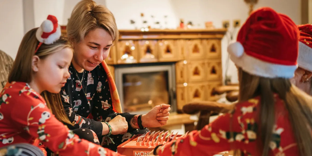 A family in Christmas pajamas | Source: Shutterstock