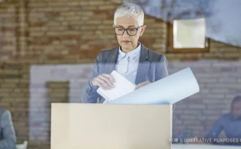 Woman putting things away in a box | Source: Shutterstock