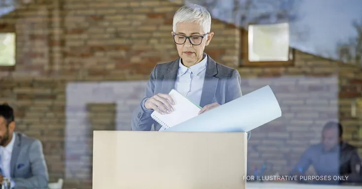 Woman putting things away in a box | Source: Shutterstock