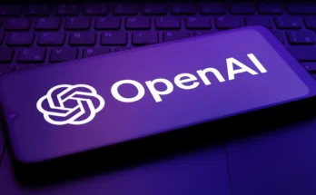 A photo of an OpenAI logo on a phone. | Source: Getty Images