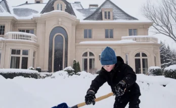 A boy shoveling snow | Source: Amomama