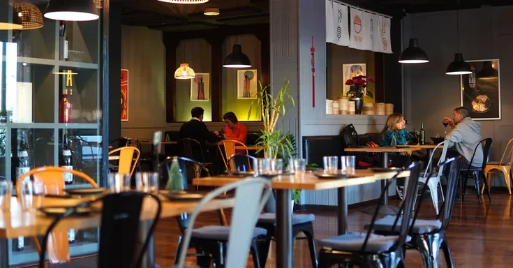 Patrons in a coffeeshop | Source: Shutterstock