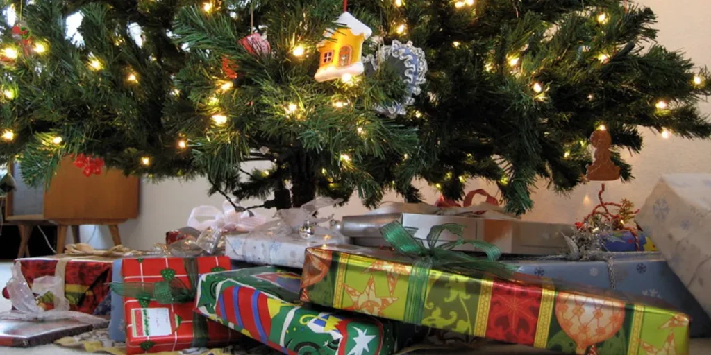 Gifts under a Christmas tree | Source: Midjourney