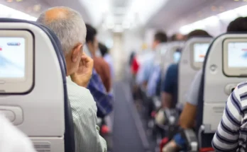 Passengers seated on a plane | Source: Shutterstock