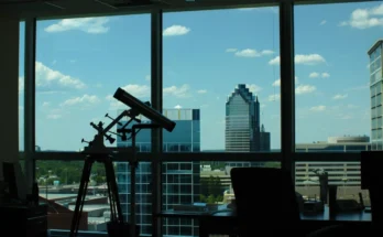 A telescope near the window | Source: Midjourney