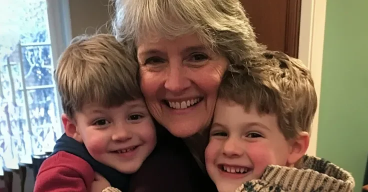 A senior woman with her twin grandsons | Source: Amomama