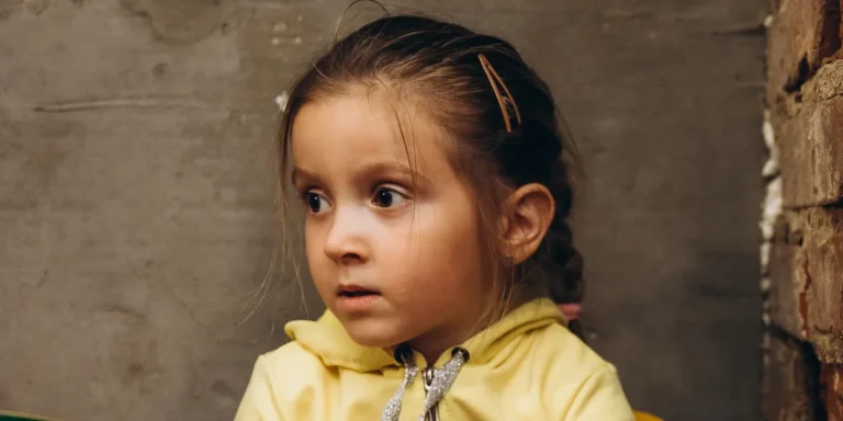 Little girl in the basement | Source: Shutterstock