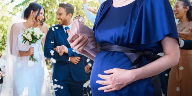 A pregnant woman at a wedding | Source: Shutterstock