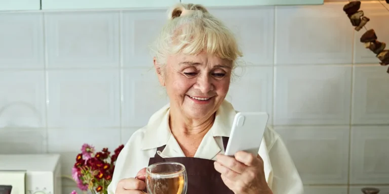 A woman using her phone | Source: Shutterstock