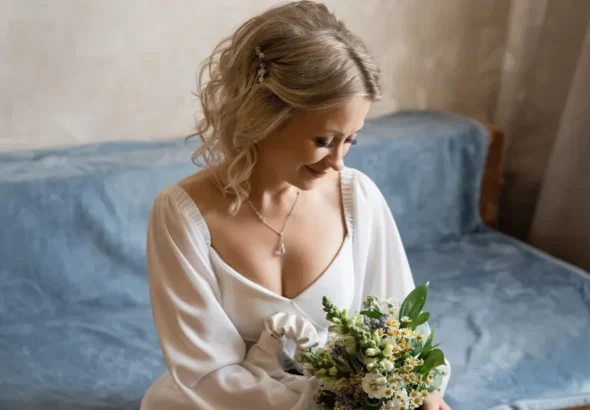 A mature woman wearing a wedding dress | Source: Shutterstock