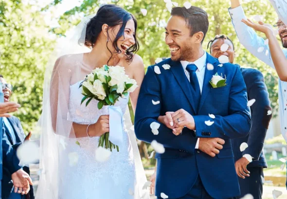 A happy couple on their wedding day | Source: Shutterstock