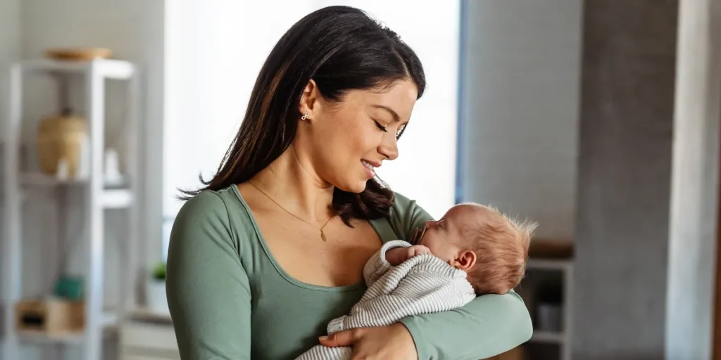 A woman with a baby | Source: Shutterstock