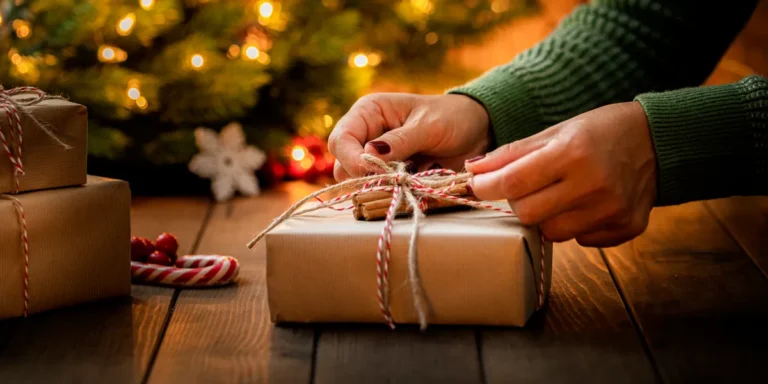 A woman wrapping a present | Source: Getty Images