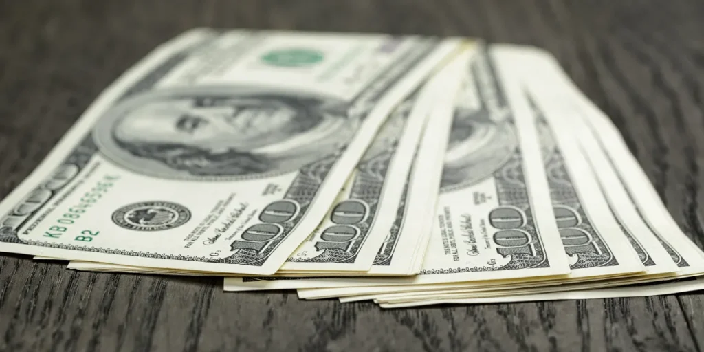 Dollar bills | Source: Shutterstock