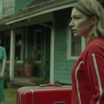 Confused woman with a suitcase standing in front of the house | Source: Midjourney