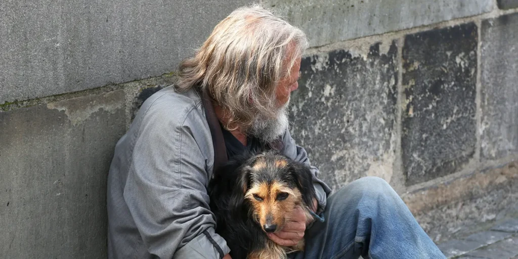 A man with a dog | Source: Shutterstock