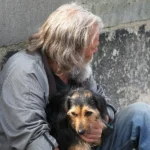 A man with a dog | Source: Shutterstock