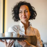 Woman working as a waitress | Source: Shutterstock